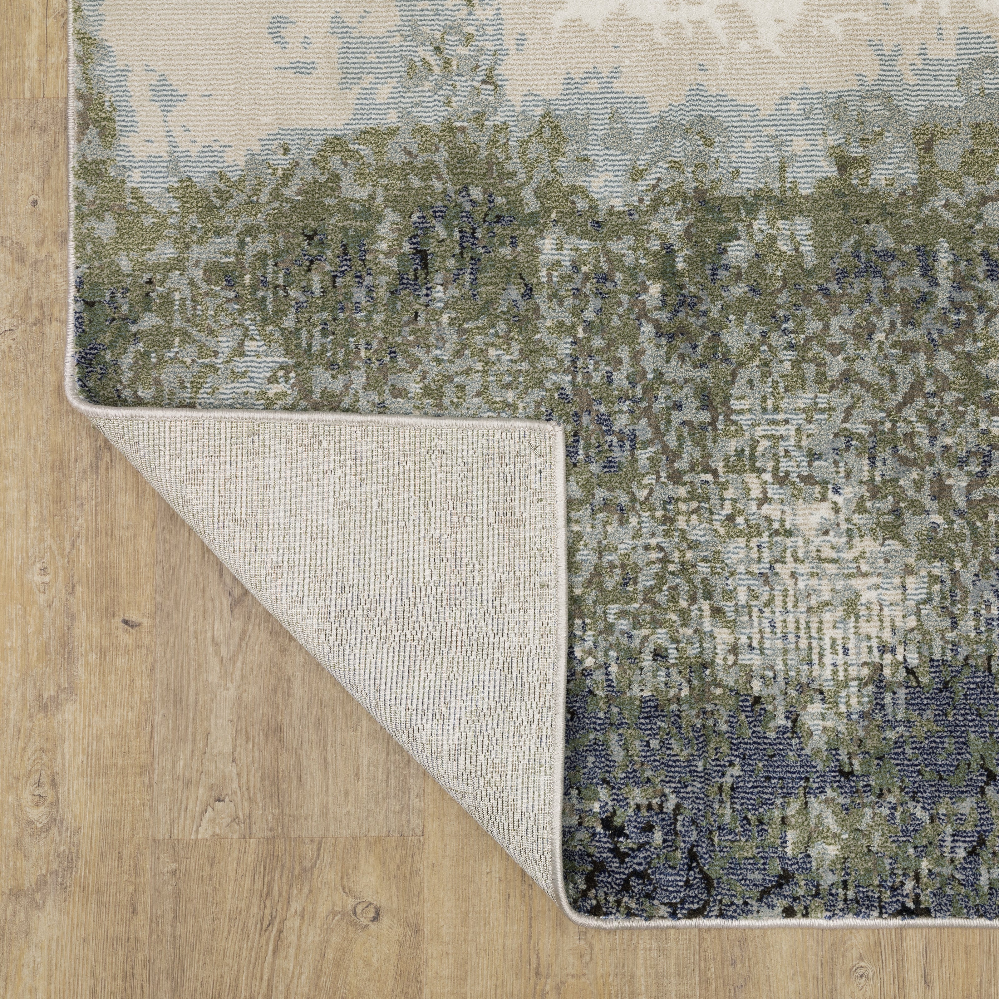Abstract grey and cream distressed rug with textured weathered design