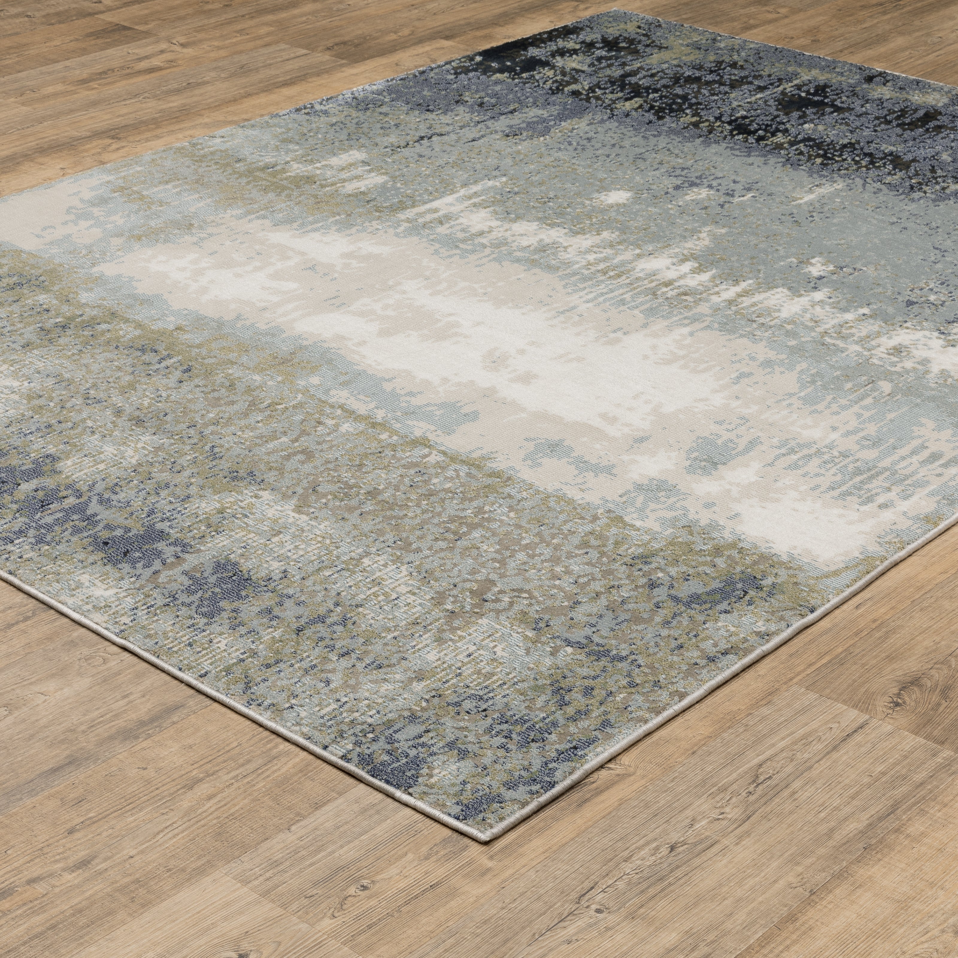 Abstract grey and cream distressed rug with textured weathered design