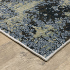 Abstract grey and cream distressed rug with textured weathered design
