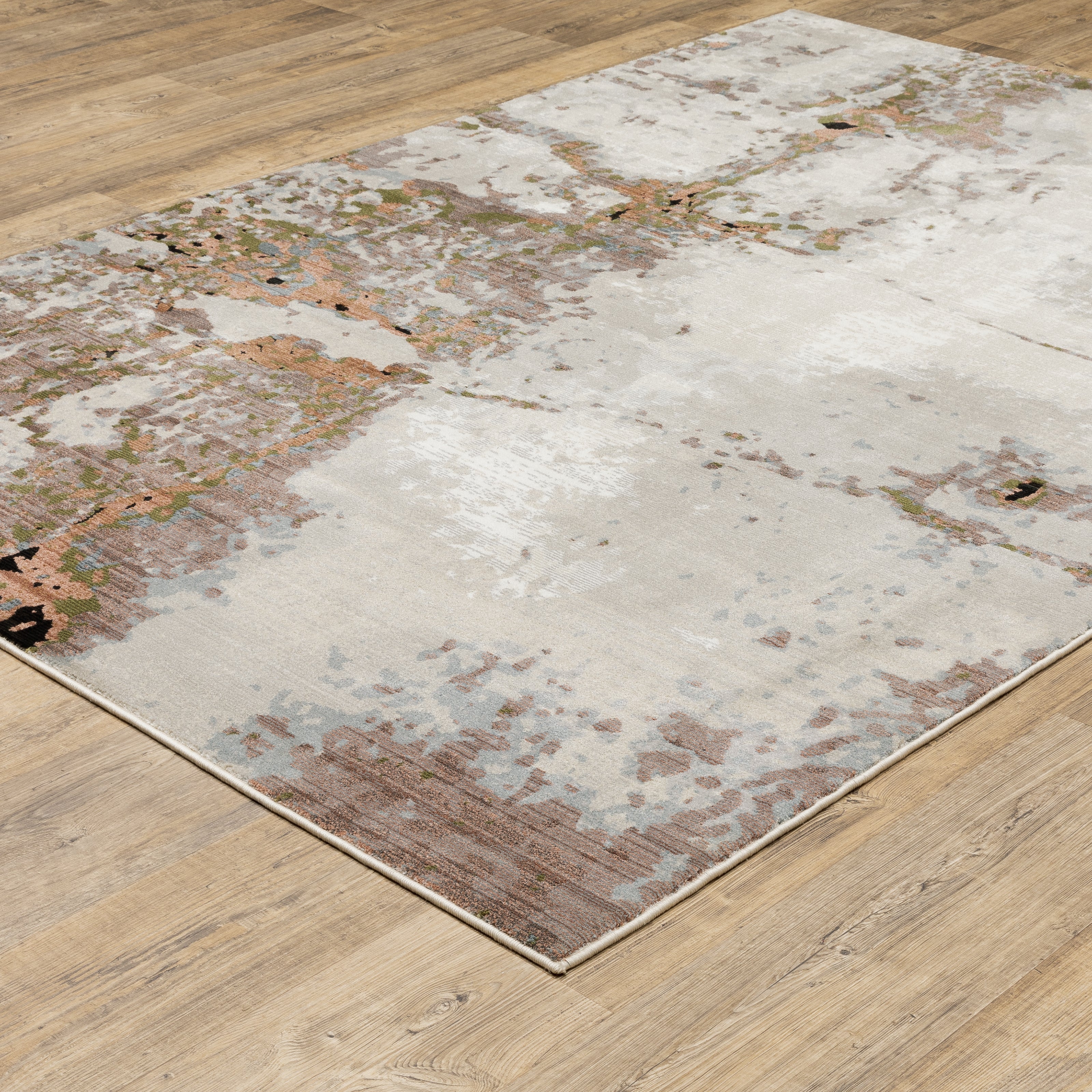 Modern distressed area rug with cream, brown, and green abstract texture pattern