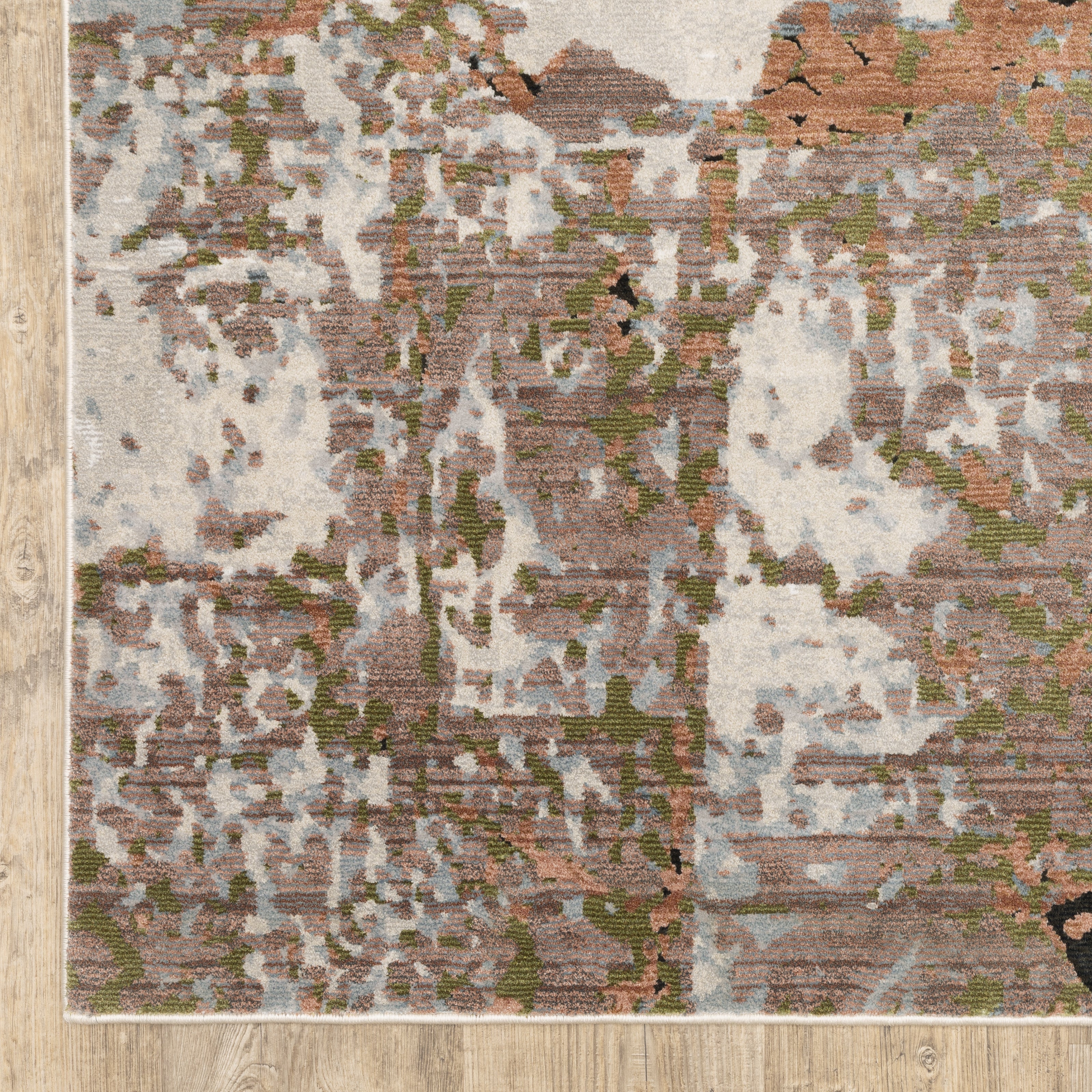 Modern distressed area rug with cream, brown, and green abstract texture pattern