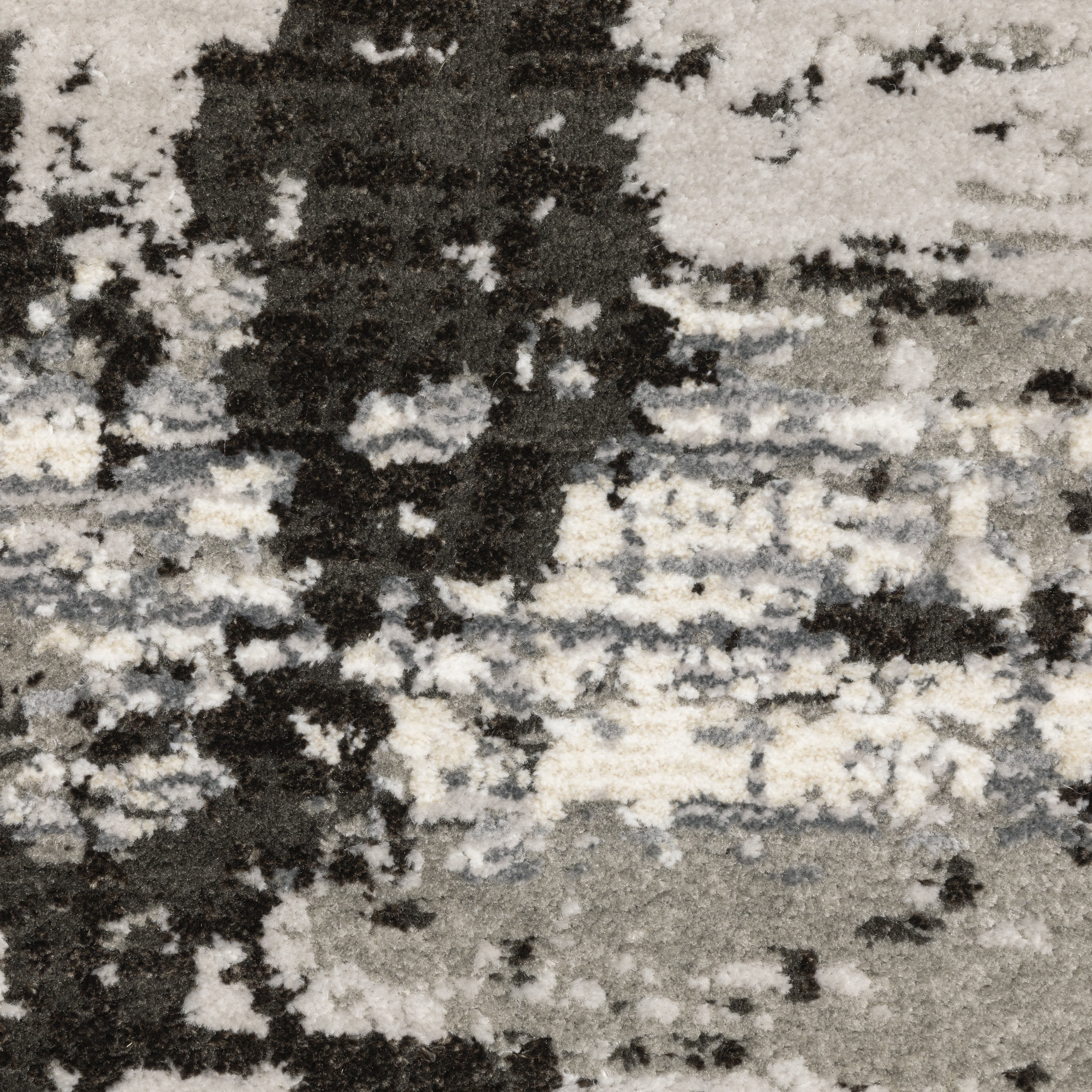 Distressed grey and black abstract textured area rug with worn vintage pattern