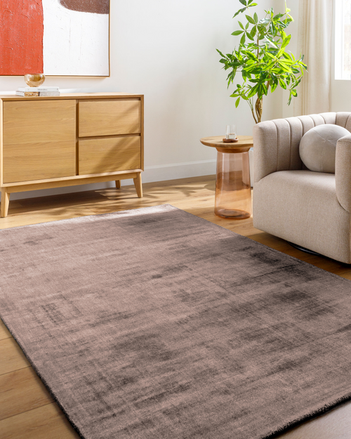 Modern distressed mauve rug with abstract worn texture pattern