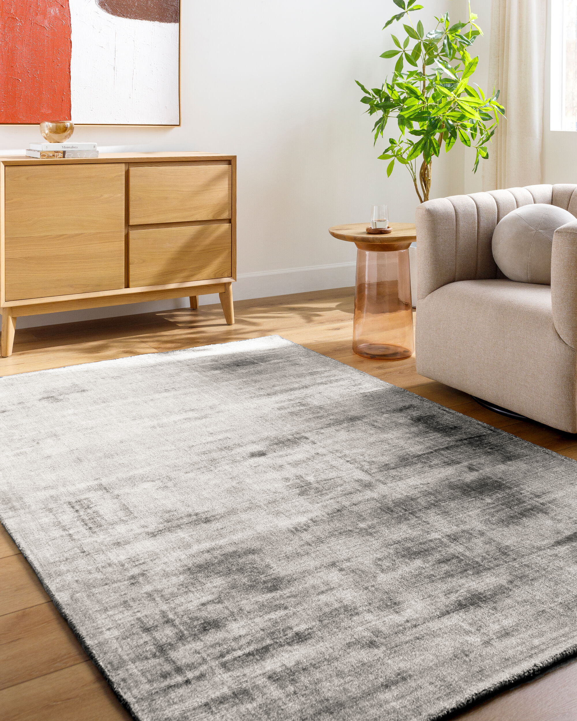 Contemporary grey textured area rug with subtle distressed pattern throughout