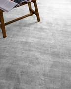 Soft gray wool area rug with subtle texture and natural weave pattern