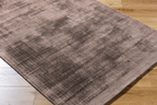 Modern distressed mauve rug with abstract worn texture pattern
