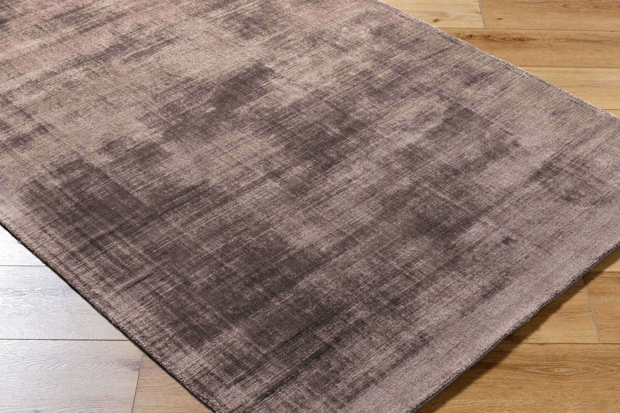 Modern distressed mauve rug with abstract worn texture pattern