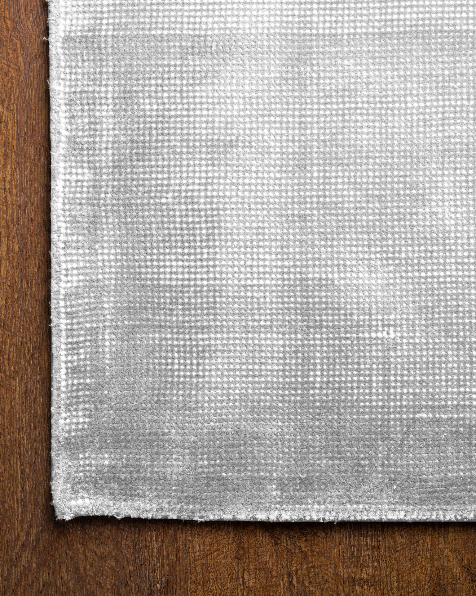 Soft gray wool area rug with subtle texture and natural weave pattern