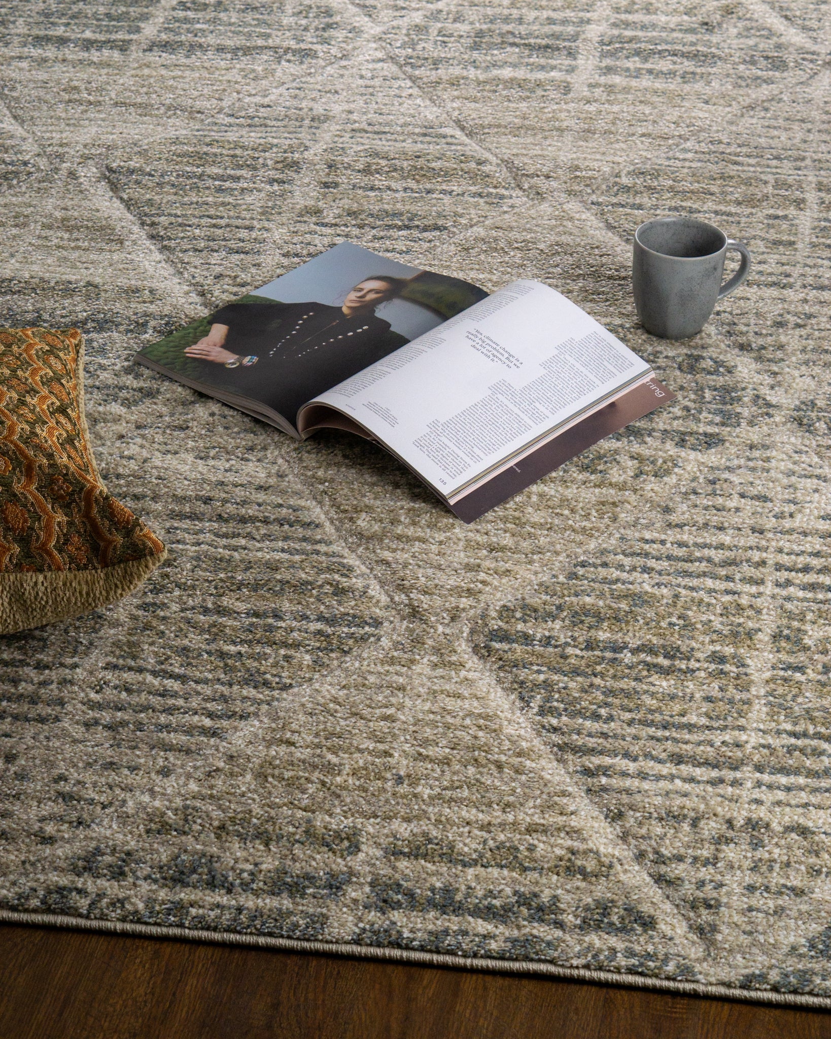 Neutral beige geometric patterned rug with textured woven appearance and diamond motifs