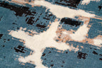 Vintage-inspired blue and cream crackle pattern area rug with distressed texture