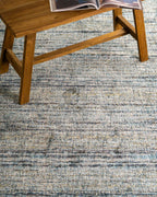 Grey and blue textured area rug with horizontal striped pattern