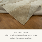 Geometric beige and cream triangle pattern rug with textured wool pile
