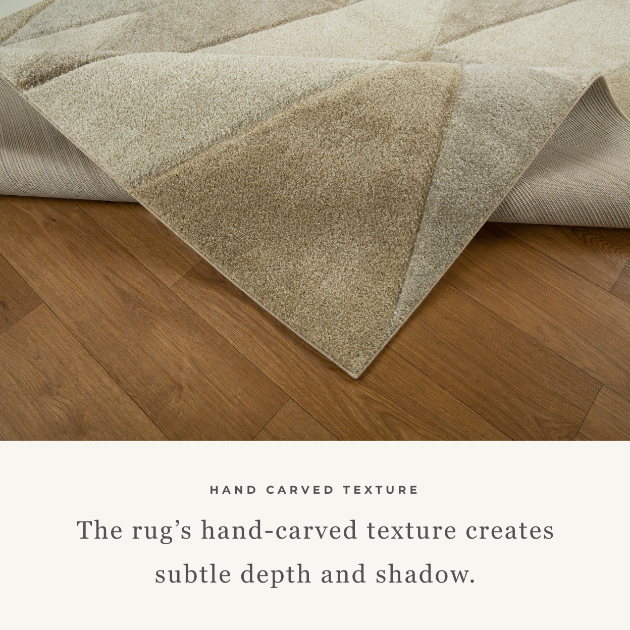 Geometric beige and cream triangle pattern rug with textured wool pile