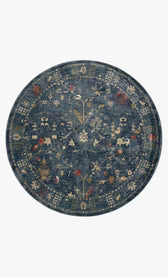 Blue vintage-style rug with floral motifs and ornate border design