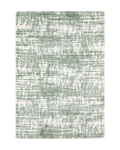 Green and white distressed textured area rug with abstract marbled pattern