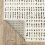 Textured cream and gold flatweave rug with woven geometric pattern design