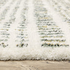 Textured cream and gold flatweave rug with woven geometric pattern design