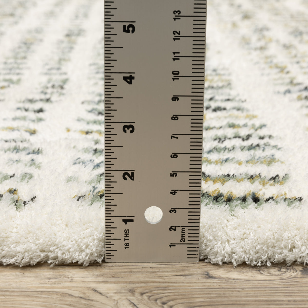Textured cream and gold flatweave rug with woven geometric pattern design