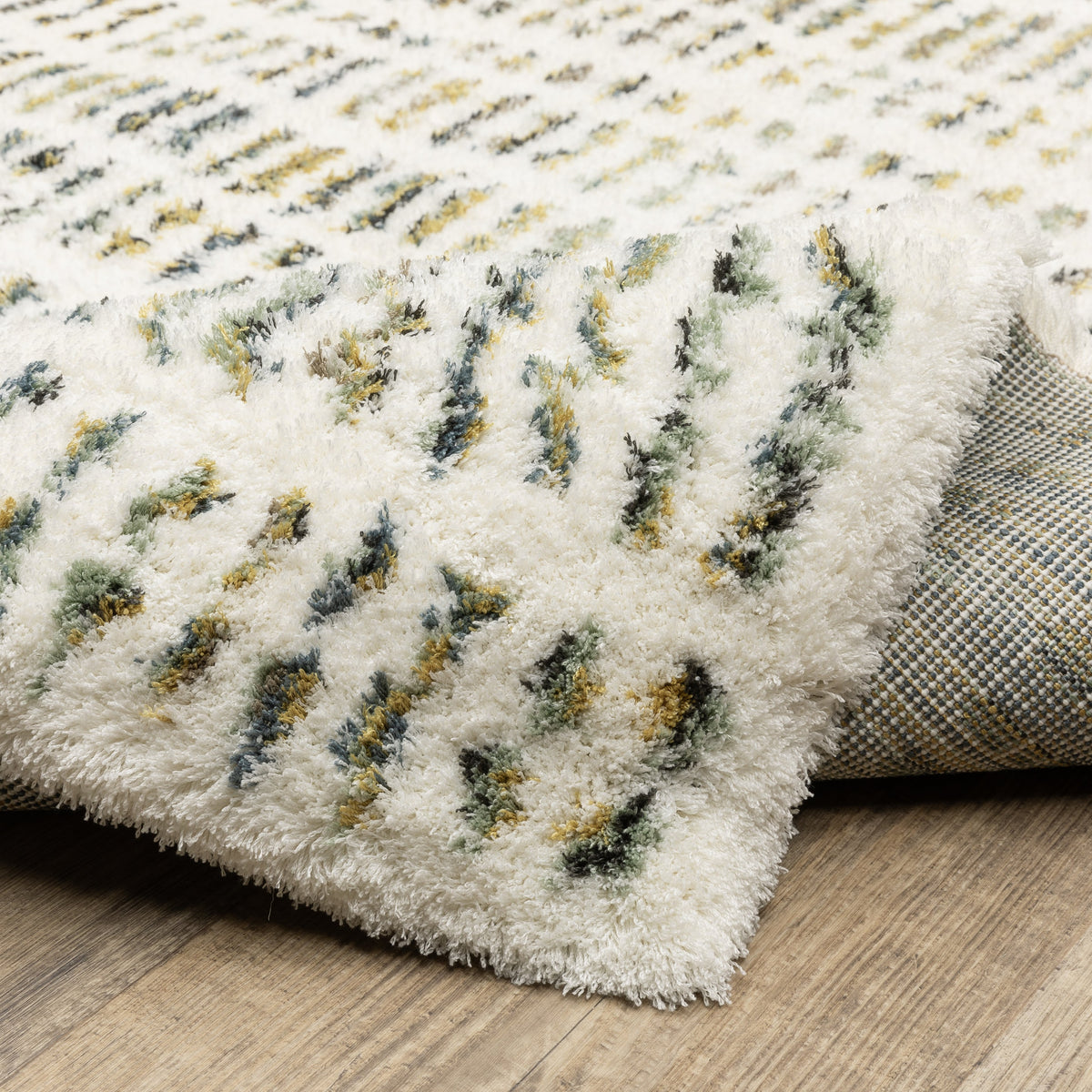 Textured cream and gold flatweave rug with woven geometric pattern design