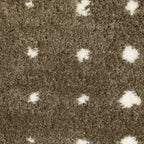 Grey wool rug with white polka dot pattern and textured surface