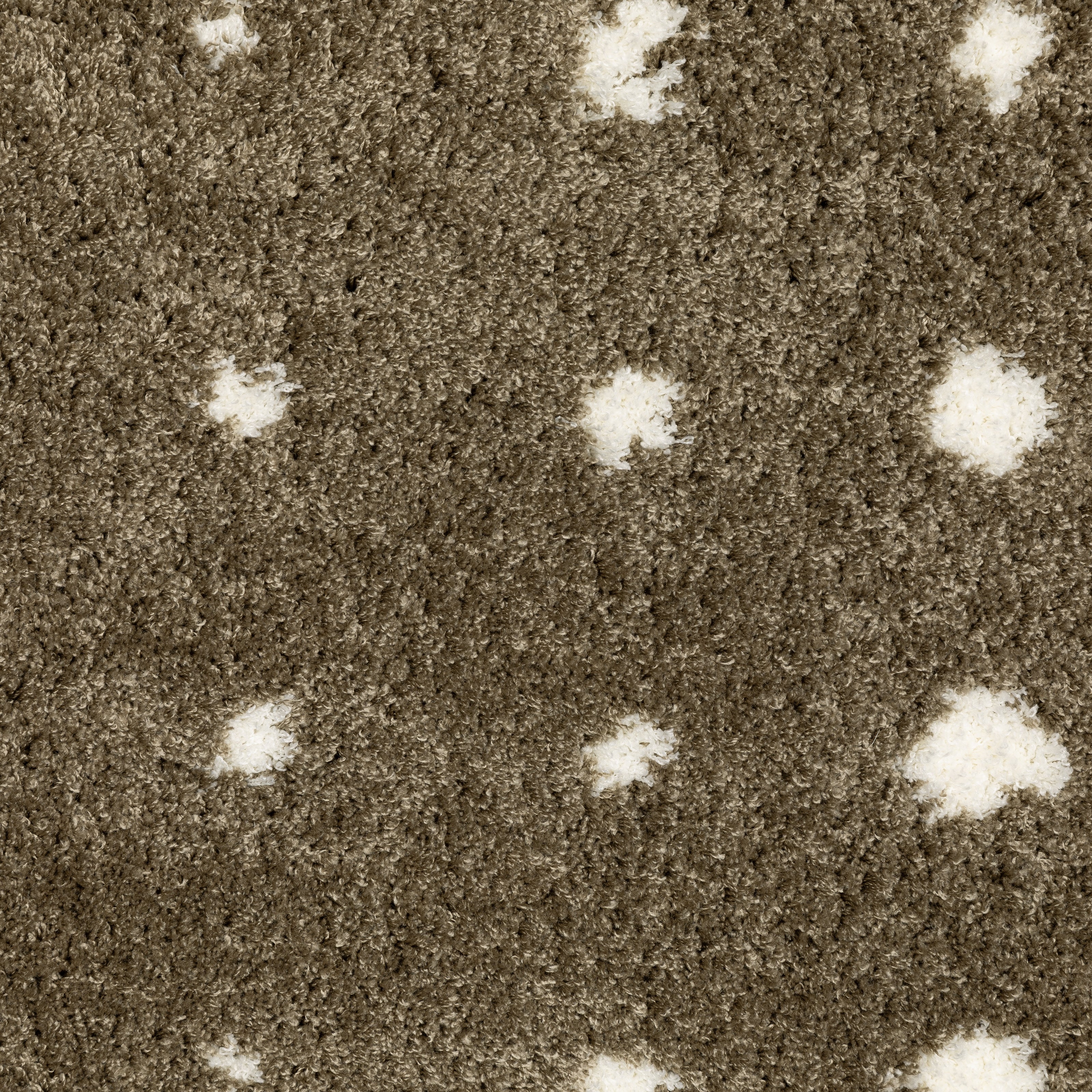 Grey wool rug with white polka dot pattern and textured surface