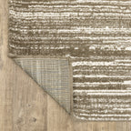 Brown and cream striped texture rug with horizontal woven pattern