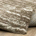 Brown and cream striped texture rug with horizontal woven pattern