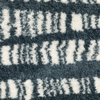 Teal and white striped wool rug with textured horizontal pattern detail