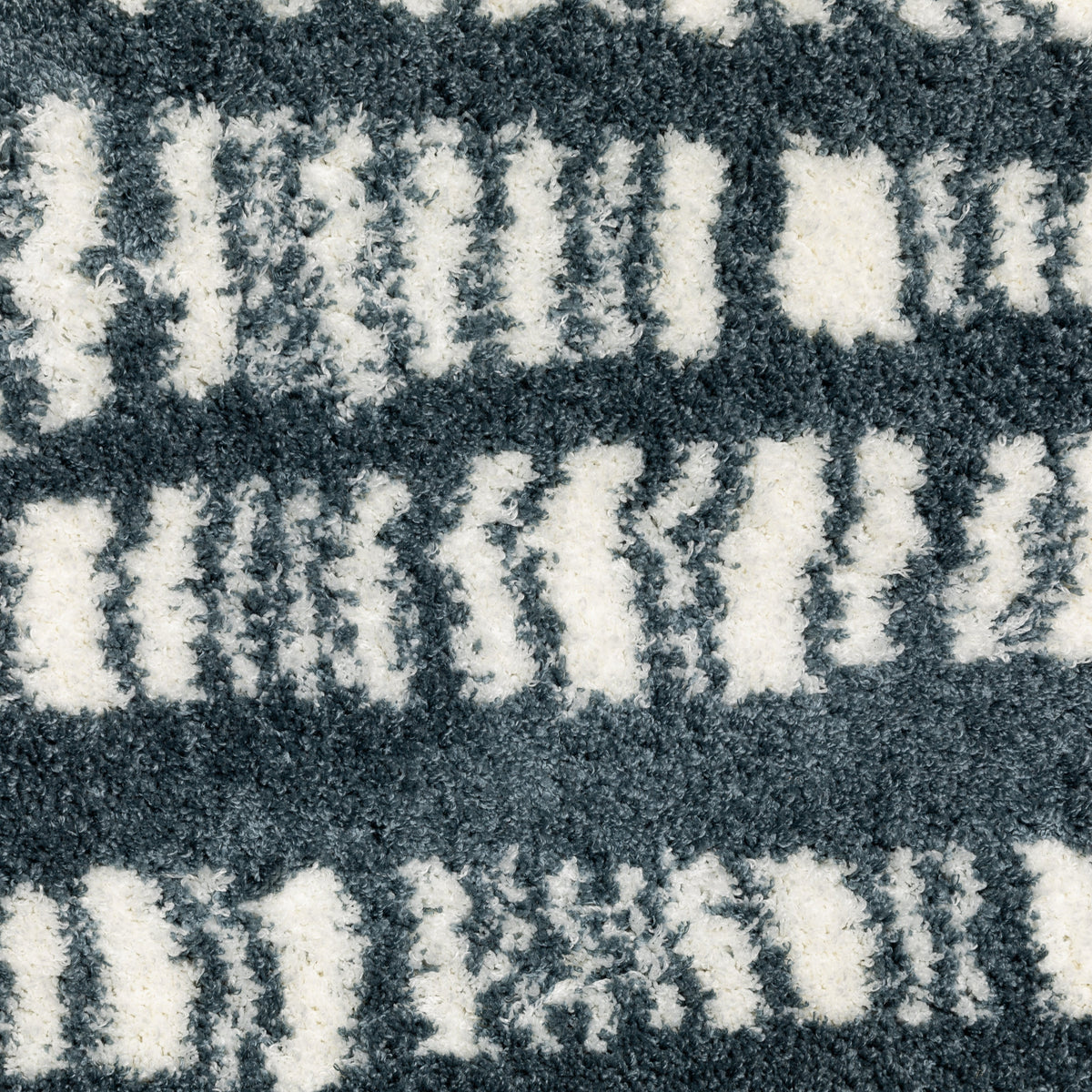 Teal and white striped wool rug with textured horizontal pattern detail
