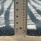 Teal and white striped wool rug with textured horizontal pattern detail