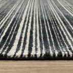 Charcoal grey striped wool rug with horizontal woven texture pattern
