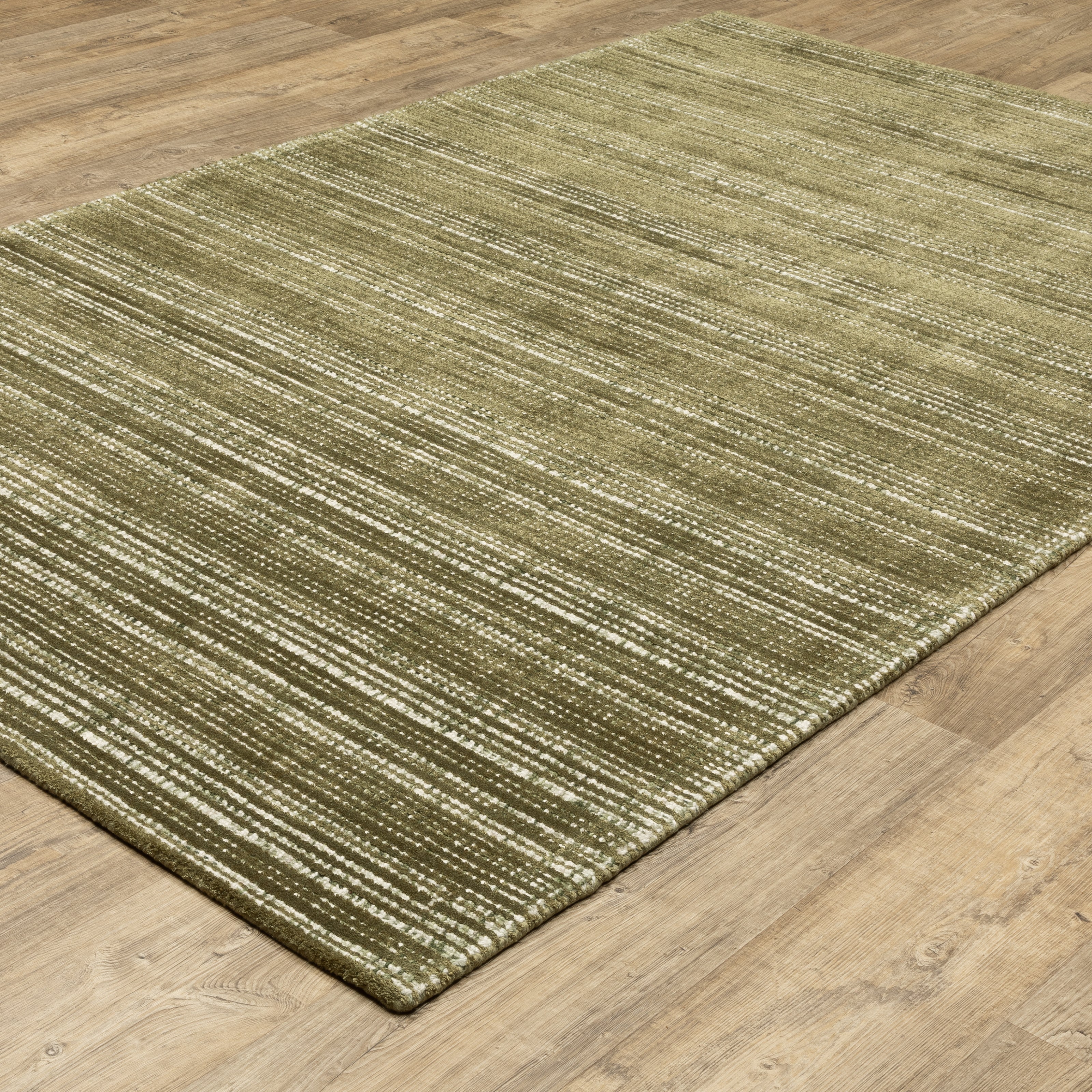 Sage green textured rug with horizontal woven pattern and natural fiber appearance