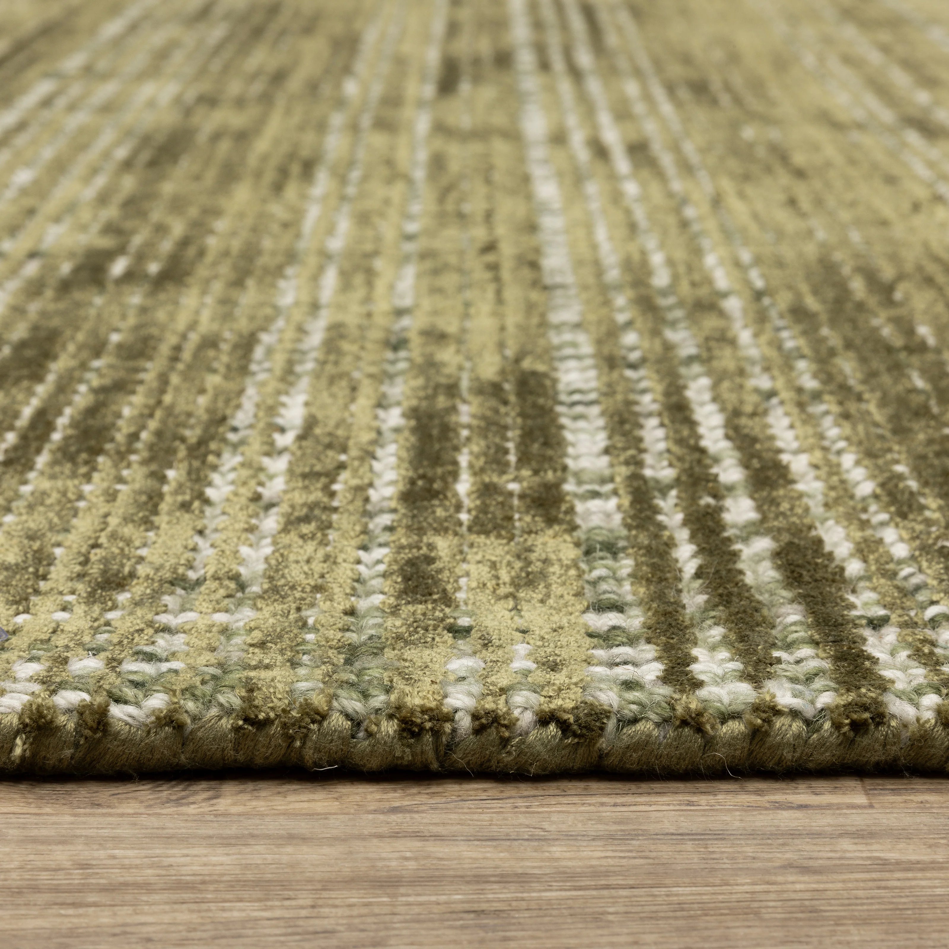 Sage green textured rug with horizontal woven pattern and natural fiber appearance