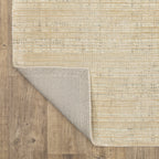 Handwoven cream and beige textured area rug with natural fiber appearance