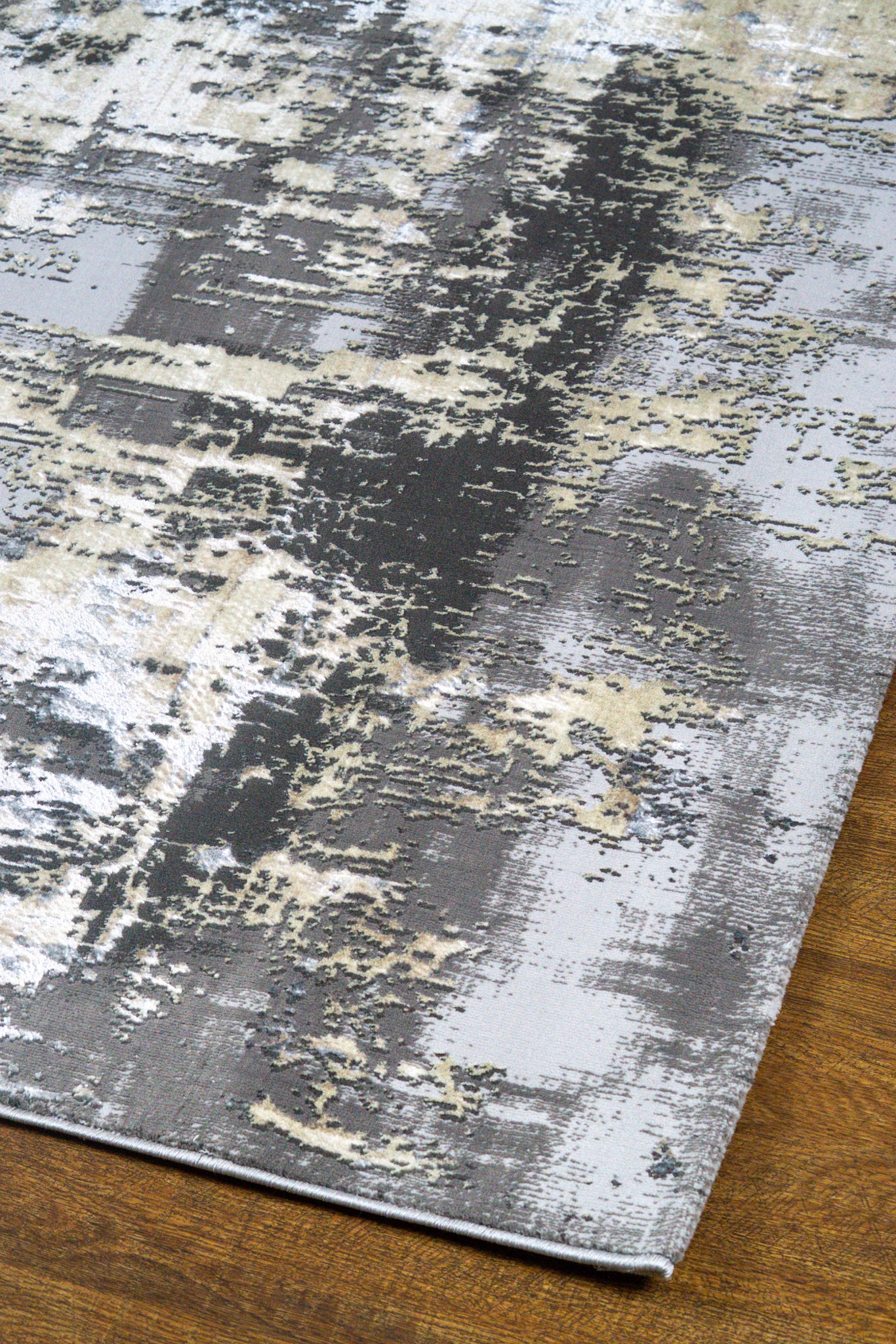 Gray and beige abstract distressed rug with modern textured pattern design