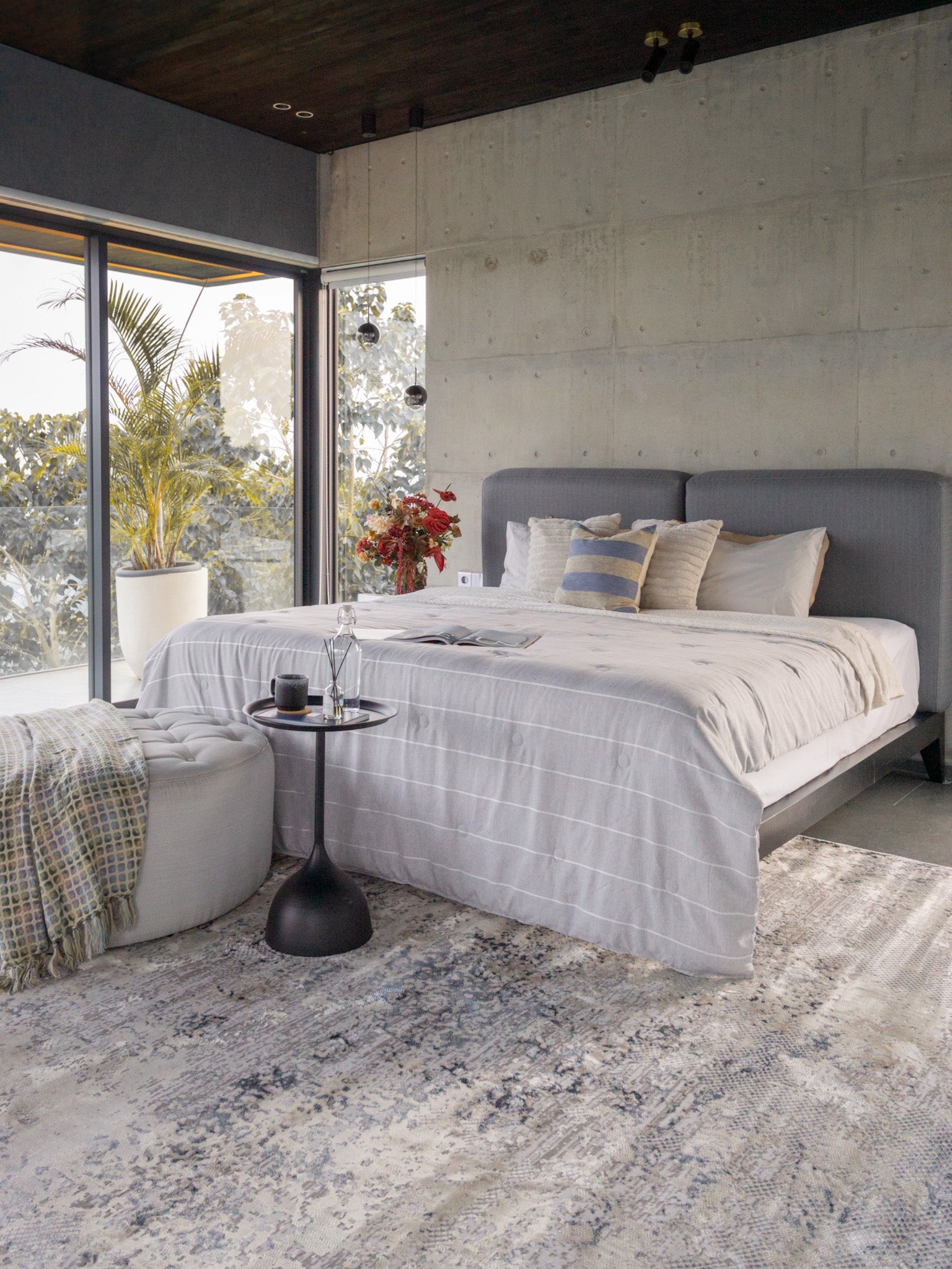 Modern distressed area rug with blue and grey abstract pattern on cream background