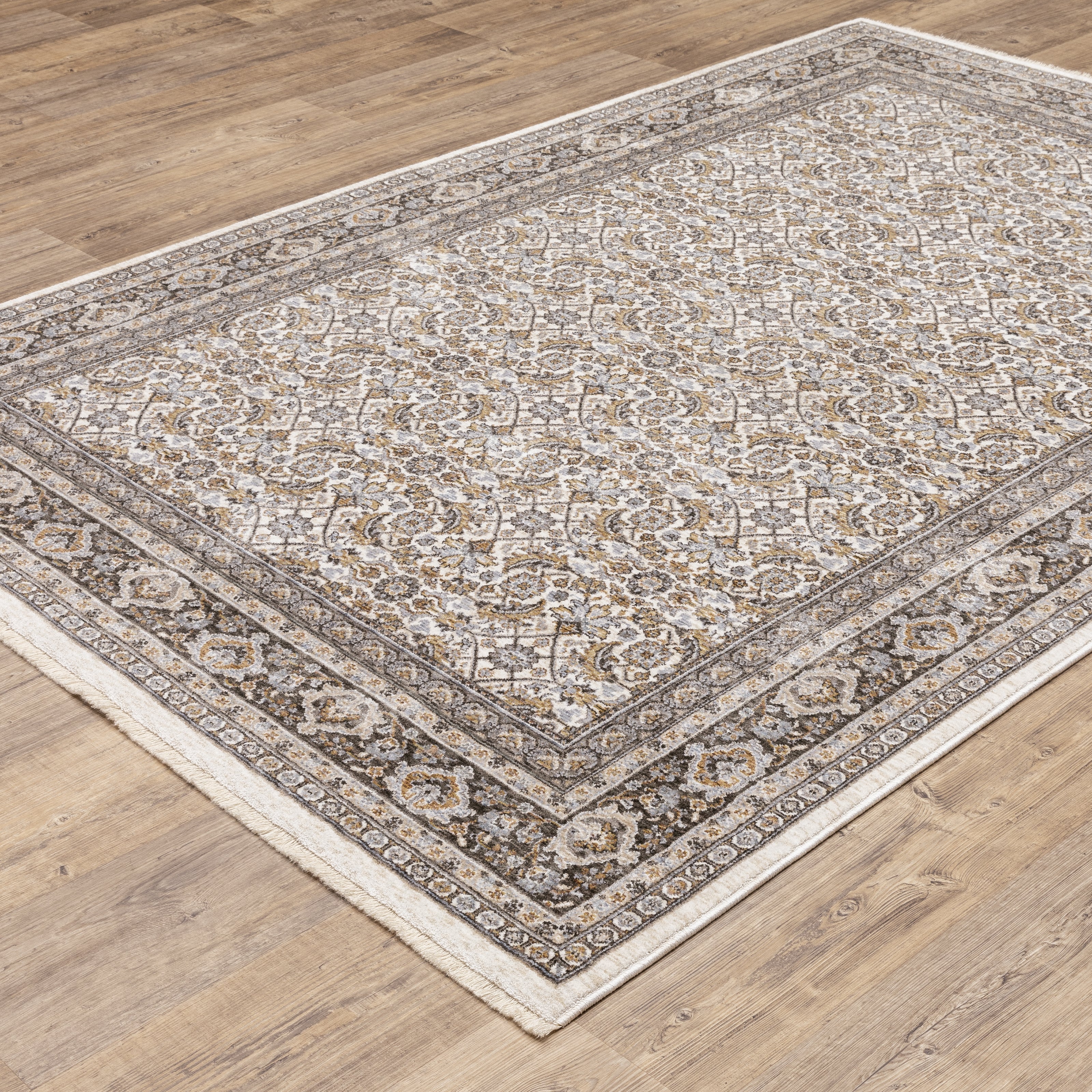 Traditional ornate rug with cream and brown geometric floral border pattern