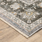 Grey and gold traditional patterned rug with dark ornate border