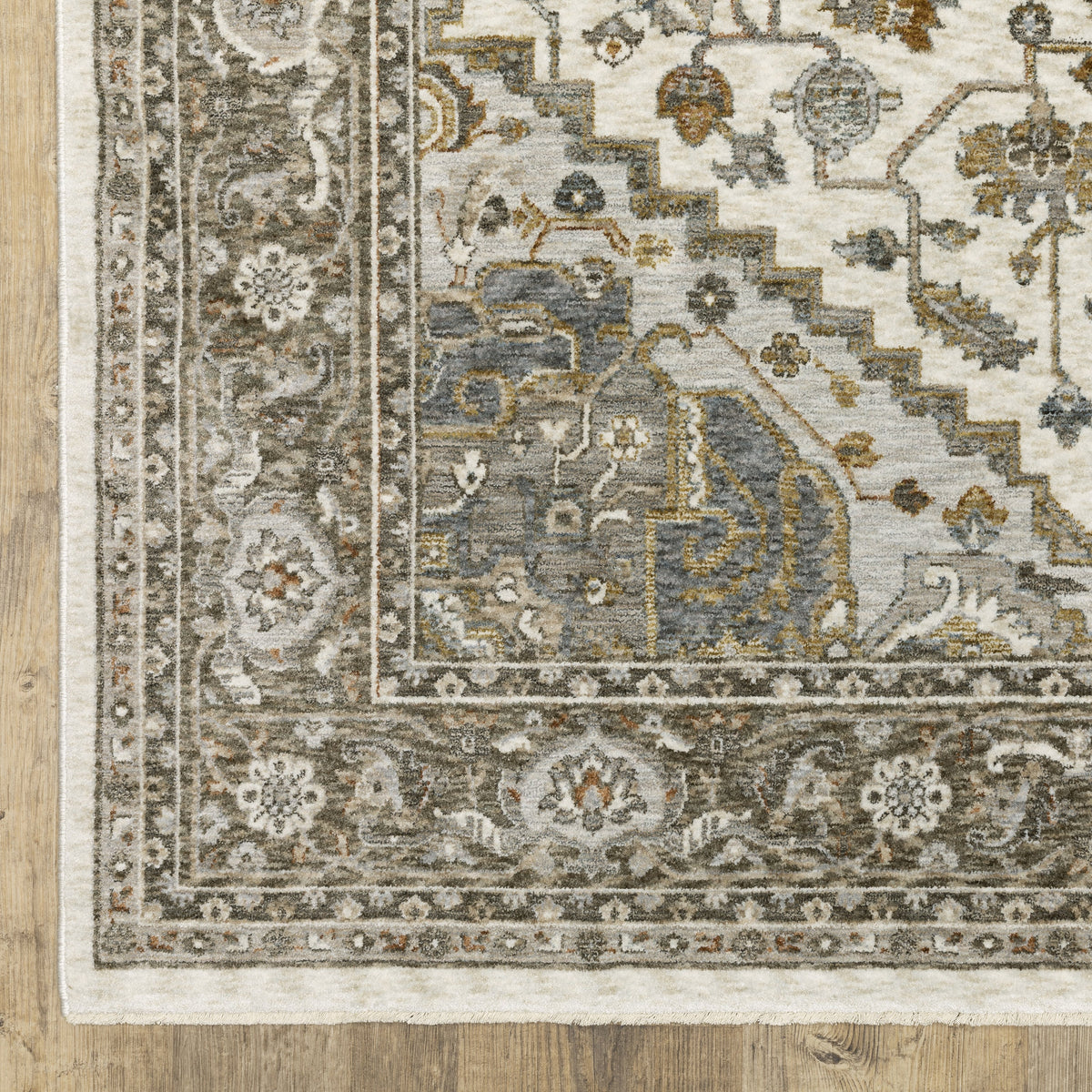 Traditional beige rug with blue and gold geometric medallion pattern and ornate borders