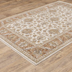 Classic floral pattern rug with cream center, terracotta border and ornate medallion design