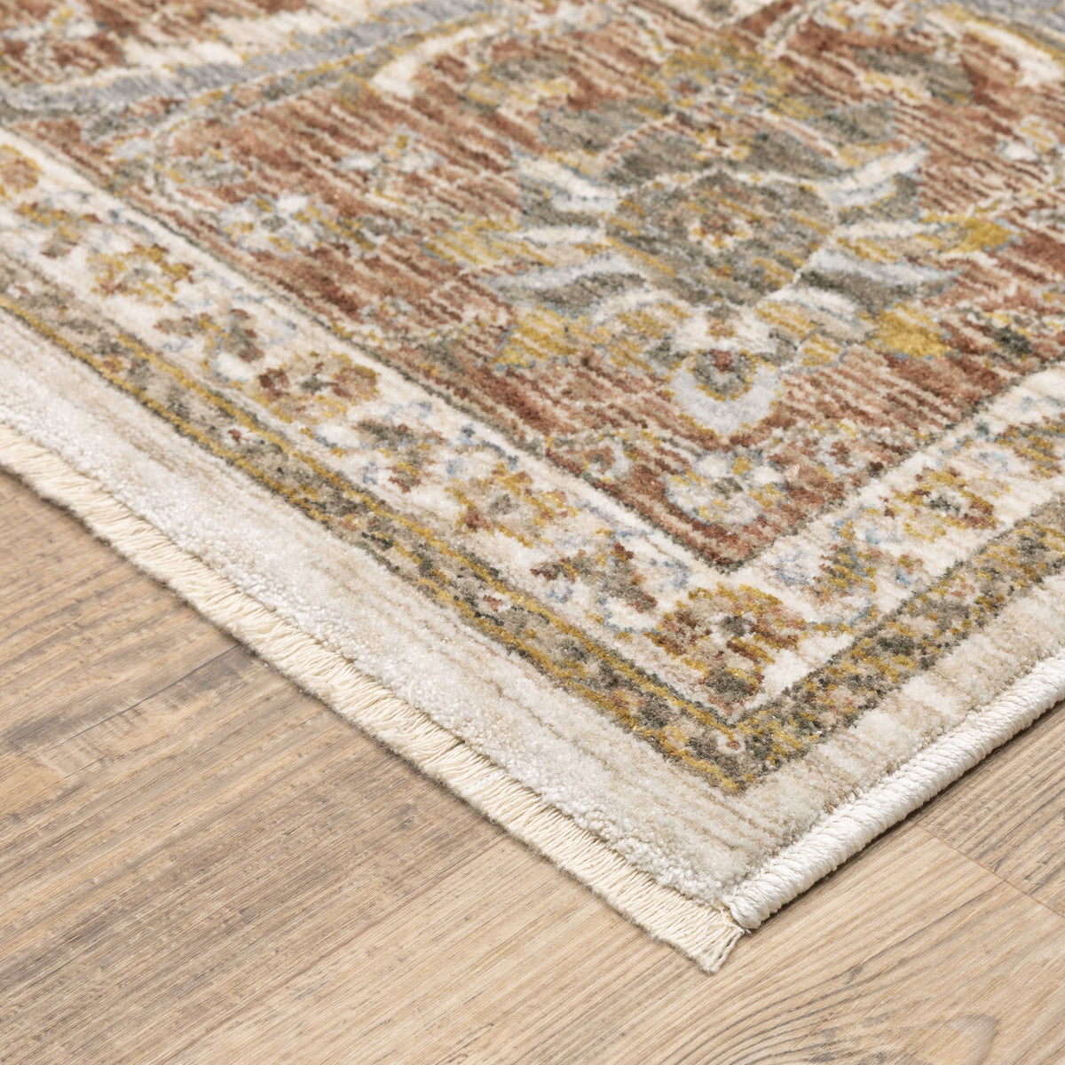 Classic floral pattern rug with cream center, terracotta border and ornate medallion design