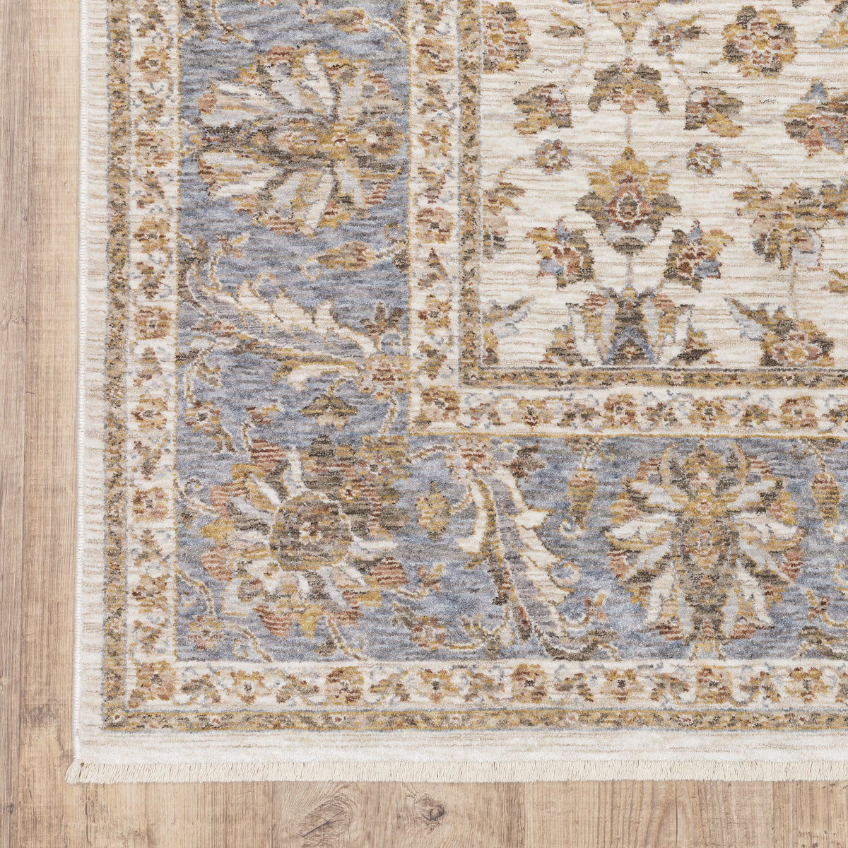 Cream and blue traditional floral area rug with ornate damask border design