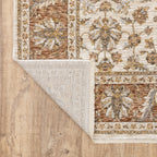 Classic floral pattern rug with cream center, terracotta border and ornate medallion design