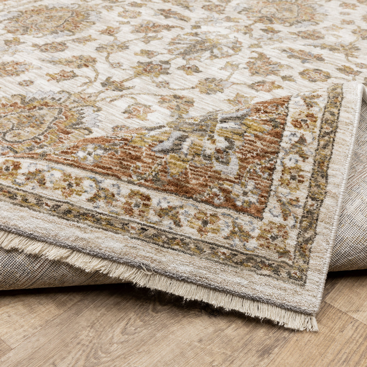 Classic floral pattern rug with cream center, terracotta border and ornate medallion design