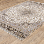 Beige traditional Persian style rug with ornate medallion and floral border patterns