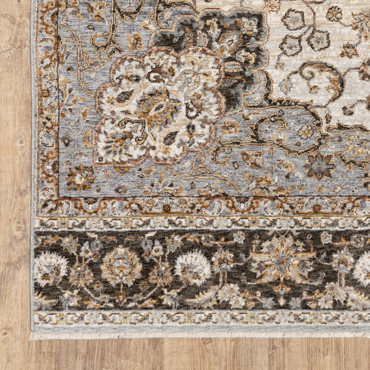 Beige traditional Persian style rug with ornate medallion and floral border patterns