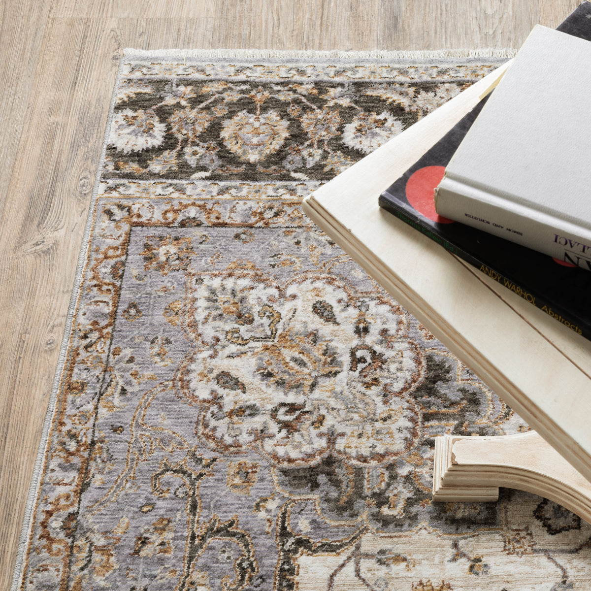 Beige traditional Persian style rug with ornate medallion and floral border patterns