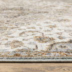 Beige traditional Persian style rug with ornate medallion and floral border patterns