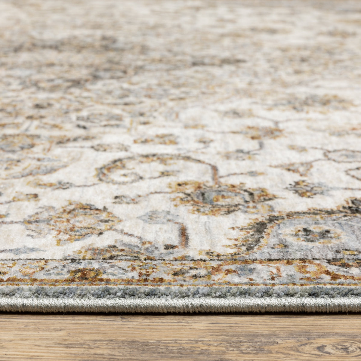 Beige traditional Persian style rug with ornate medallion and floral border patterns