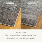 Gray textured area rug with white linear crosshatch pattern throughout